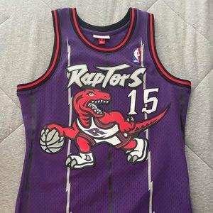 Mitchell and ness adult medium Vince carter jersey. Great condition.